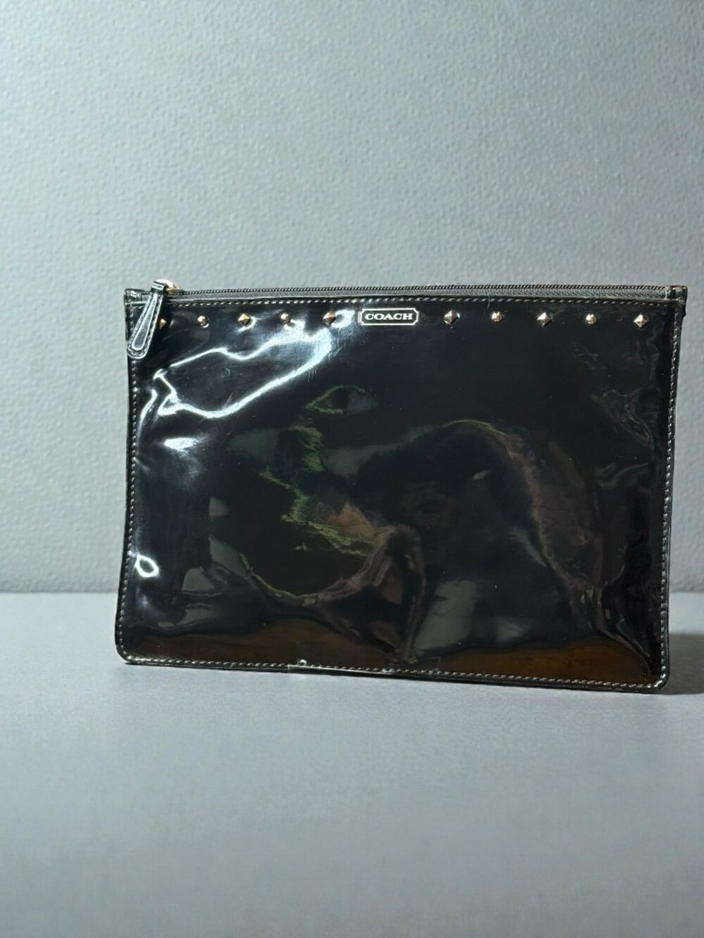 Coach Studded Liquid Gloss Clutch